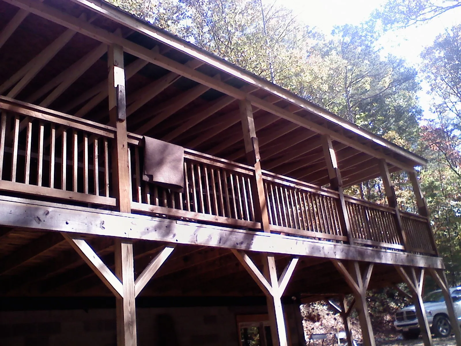 Timber framing under a new elevated porch and deck — Roof Leak Repair in Bloomingburg by Roofing Brothers